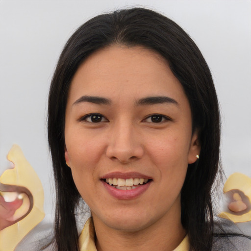 Joyful asian young-adult female with long  brown hair and brown eyes