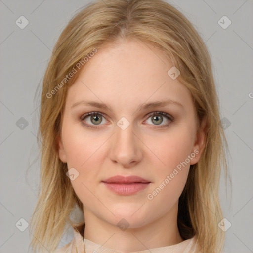 Joyful white young-adult female with medium  brown hair and blue eyes