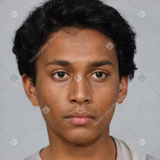 Neutral latino young-adult male with short  black hair and brown eyes