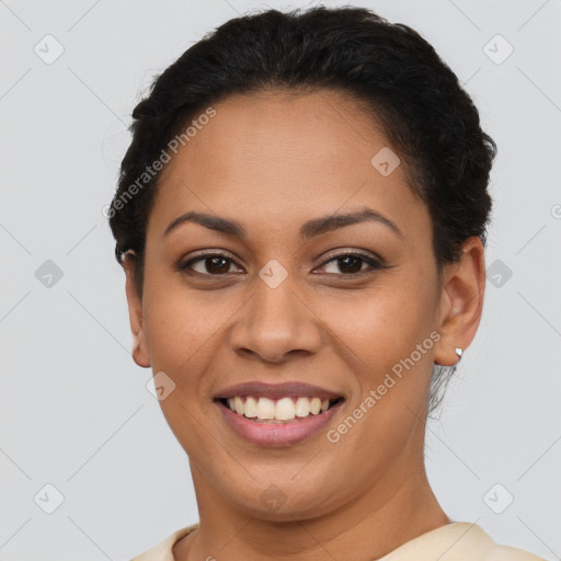 Joyful latino young-adult female with short  brown hair and brown eyes