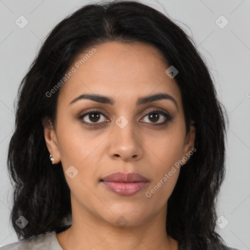 Joyful latino young-adult female with long  brown hair and brown eyes