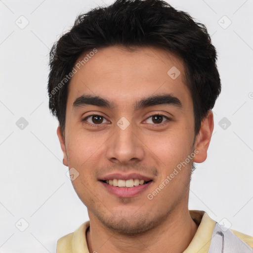 Joyful white young-adult male with short  black hair and brown eyes