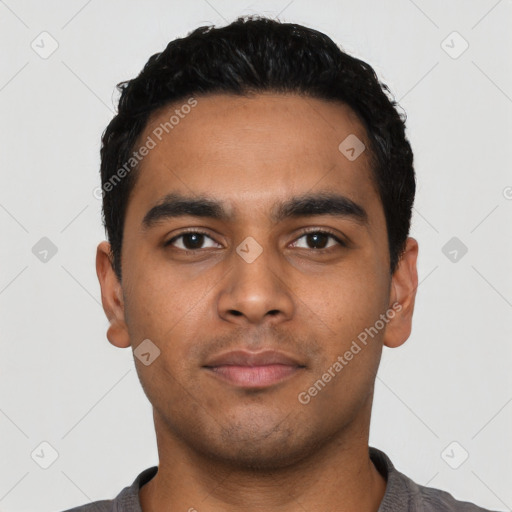 Neutral latino young-adult male with short  black hair and brown eyes