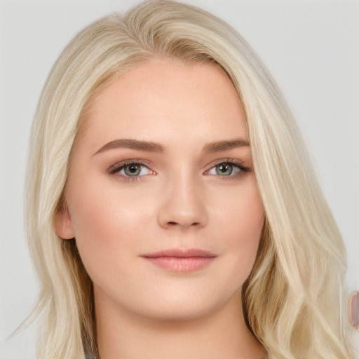 Neutral white young-adult female with long  blond hair and brown eyes