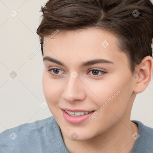 Joyful white child female with short  brown hair and brown eyes