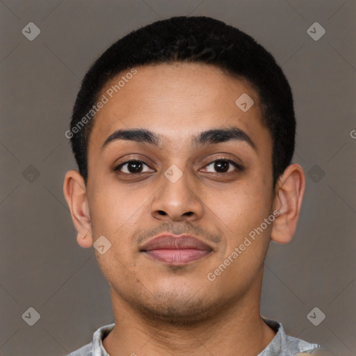 Joyful latino young-adult male with short  brown hair and brown eyes