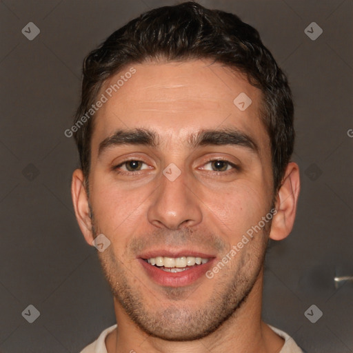 Joyful white young-adult male with short  brown hair and brown eyes