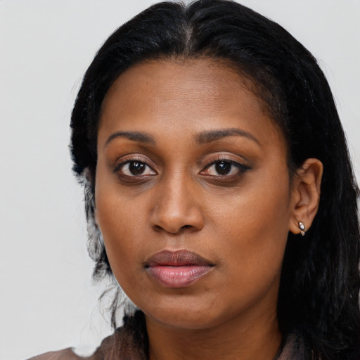 Neutral black young-adult female with long  black hair and brown eyes