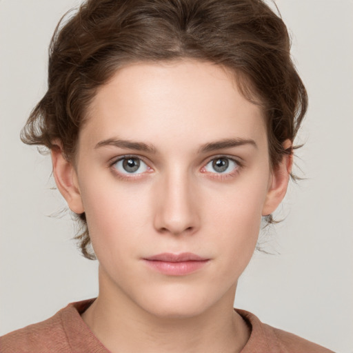 Neutral white young-adult female with short  brown hair and grey eyes