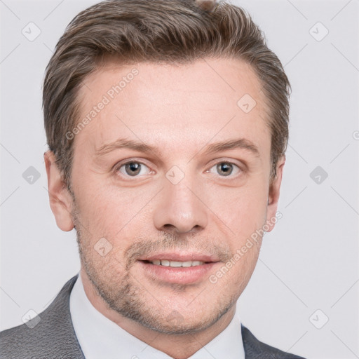 Joyful white adult male with short  brown hair and grey eyes