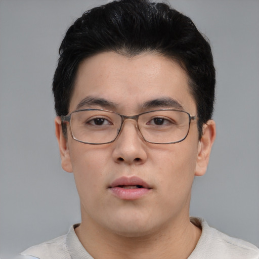 Neutral asian young-adult male with short  black hair and brown eyes