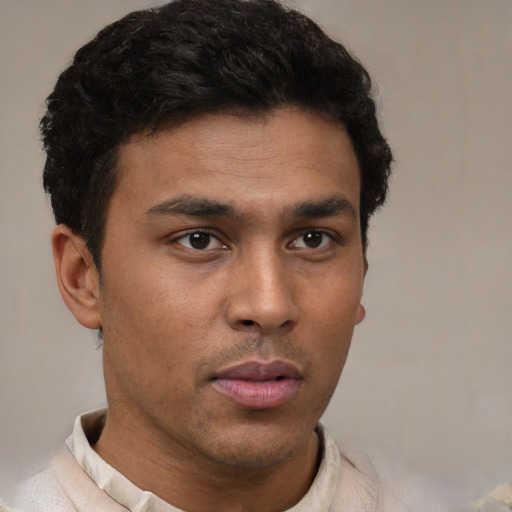 Neutral latino young-adult male with short  brown hair and brown eyes