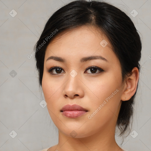 Neutral asian young-adult female with medium  brown hair and brown eyes