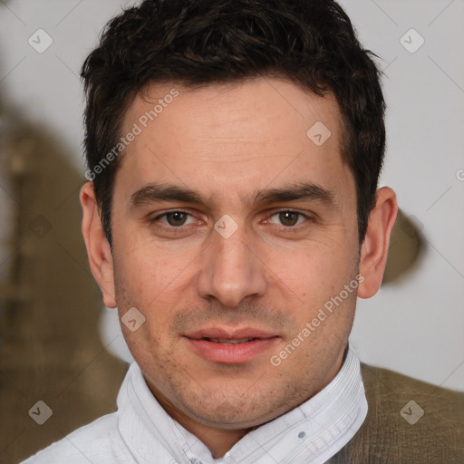 Joyful white adult male with short  brown hair and brown eyes