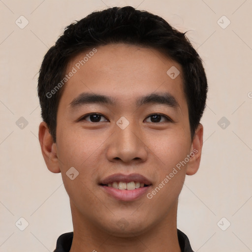 Joyful asian young-adult male with short  brown hair and brown eyes