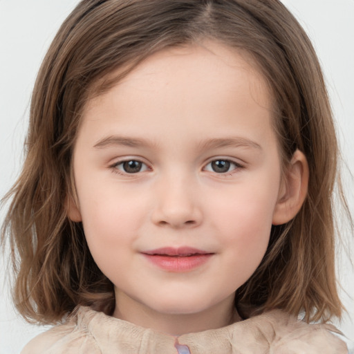 Joyful white child female with medium  brown hair and grey eyes