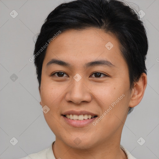 Joyful asian young-adult female with short  brown hair and brown eyes