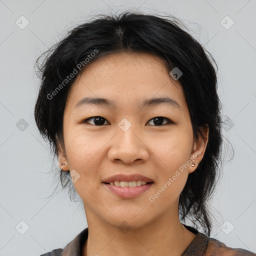 Joyful asian young-adult female with medium  black hair and brown eyes