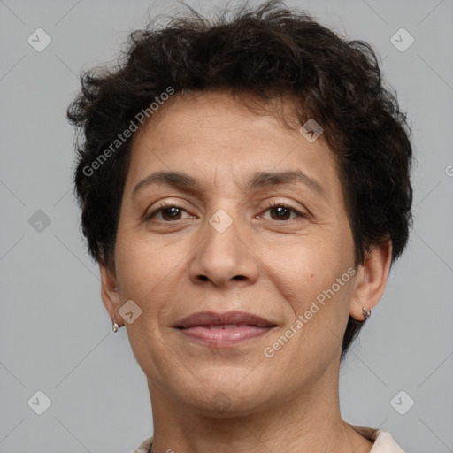 Joyful white adult female with short  brown hair and brown eyes