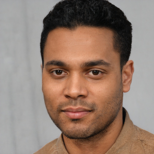 Neutral latino young-adult male with short  black hair and brown eyes