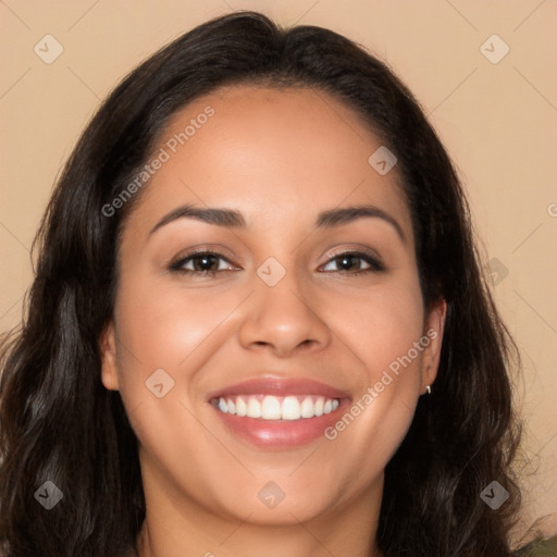 Joyful latino young-adult female with long  brown hair and brown eyes