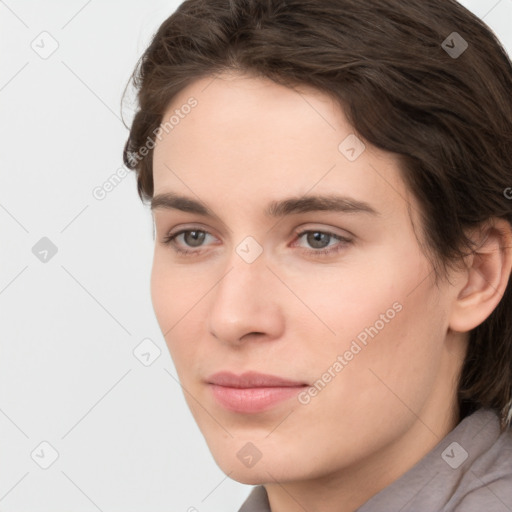 Neutral white young-adult female with short  brown hair and brown eyes