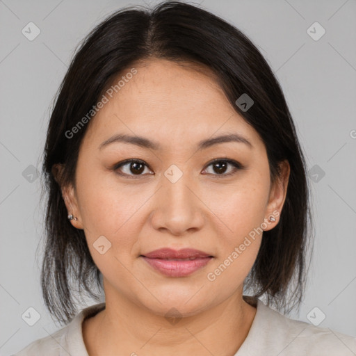 Joyful latino young-adult female with medium  brown hair and brown eyes