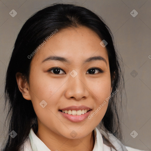 Joyful asian young-adult female with medium  black hair and brown eyes