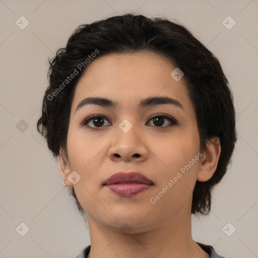 Joyful asian young-adult female with medium  black hair and brown eyes