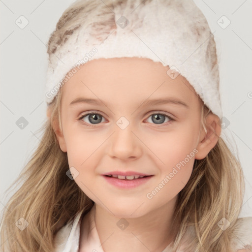 Joyful white child female with medium  brown hair and blue eyes