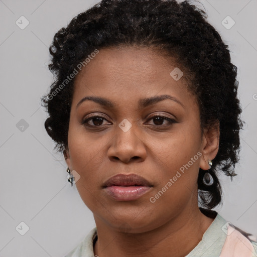 Neutral black young-adult female with short  brown hair and brown eyes