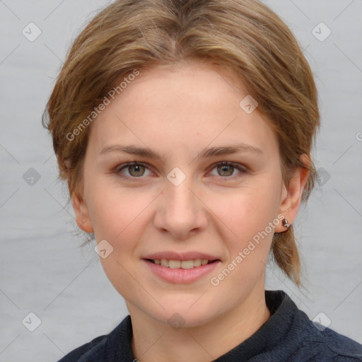 Joyful white young-adult female with medium  brown hair and blue eyes