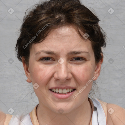 Joyful white adult female with short  brown hair and brown eyes