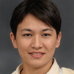 Joyful white adult female with short  brown hair and brown eyes