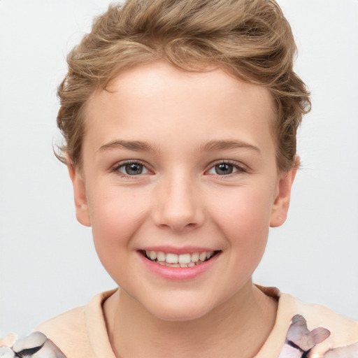 Joyful white child female with short  brown hair and brown eyes