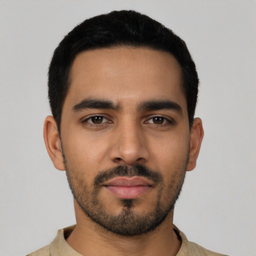 Neutral latino young-adult male with short  black hair and brown eyes