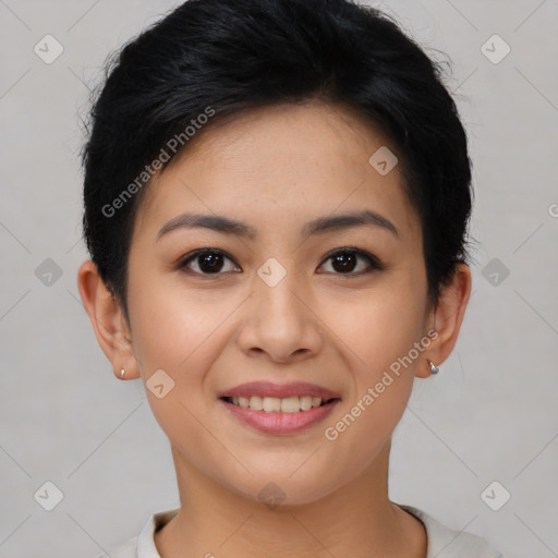 Joyful asian young-adult female with short  black hair and brown eyes