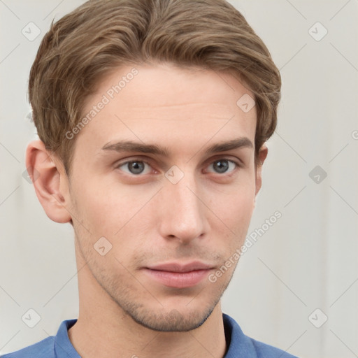 Neutral white young-adult male with short  brown hair and grey eyes