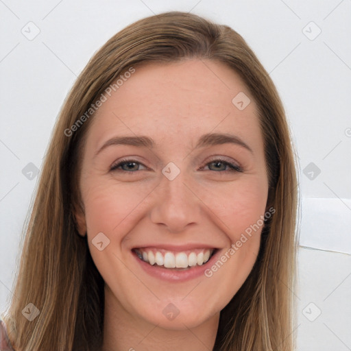 Joyful white young-adult female with long  brown hair and grey eyes