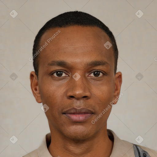 Neutral black young-adult male with short  black hair and brown eyes