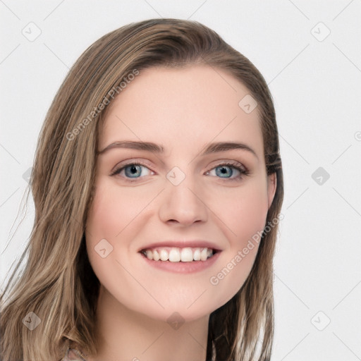 Joyful white young-adult female with long  brown hair and blue eyes