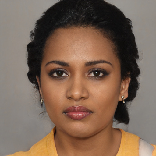 Neutral black young-adult female with long  black hair and brown eyes