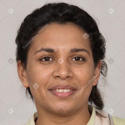 Joyful latino adult female with short  brown hair and brown eyes