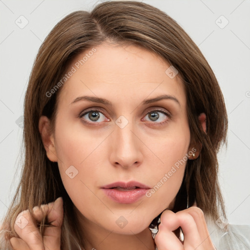 Neutral white young-adult female with long  brown hair and brown eyes