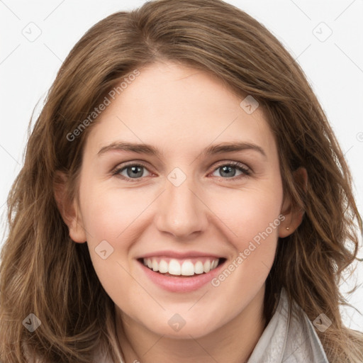 Joyful white young-adult female with long  brown hair and green eyes