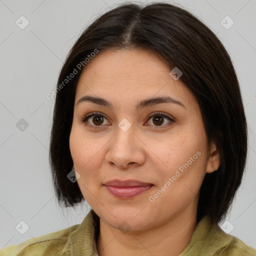 Joyful asian young-adult female with medium  brown hair and brown eyes