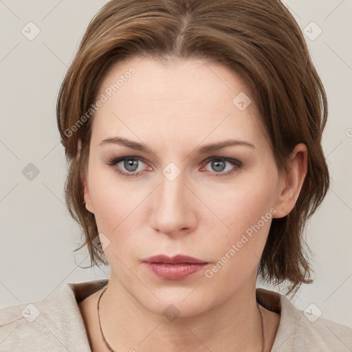 Neutral white young-adult female with medium  brown hair and grey eyes