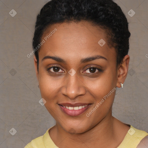 Joyful black young-adult female with short  brown hair and brown eyes