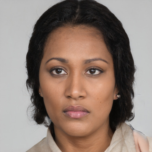 Neutral black young-adult female with long  black hair and brown eyes
