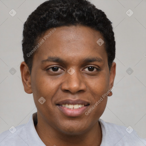 Joyful black young-adult male with short  brown hair and brown eyes